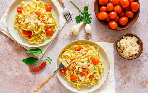 Geroosterde tomaten met spaghetti agglio e olio